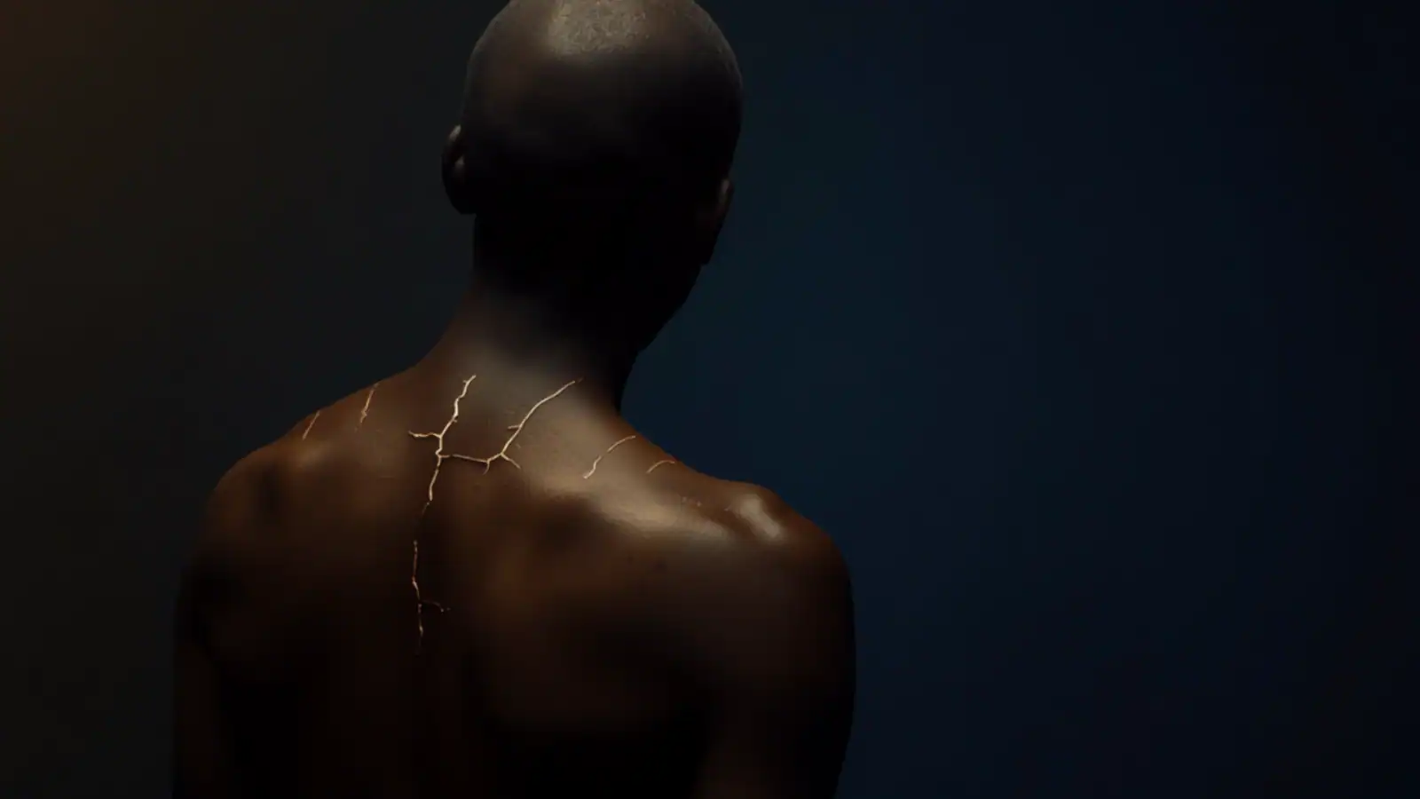 Kintsugi figure illustrating trauma stored in the body after betrayal